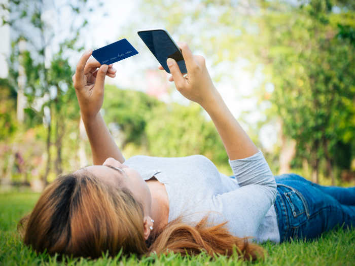 Girl using mobile financial app